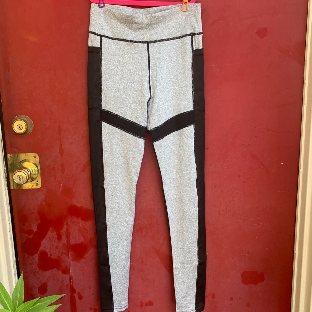 Exercise pants. Black and gray with mesh insert